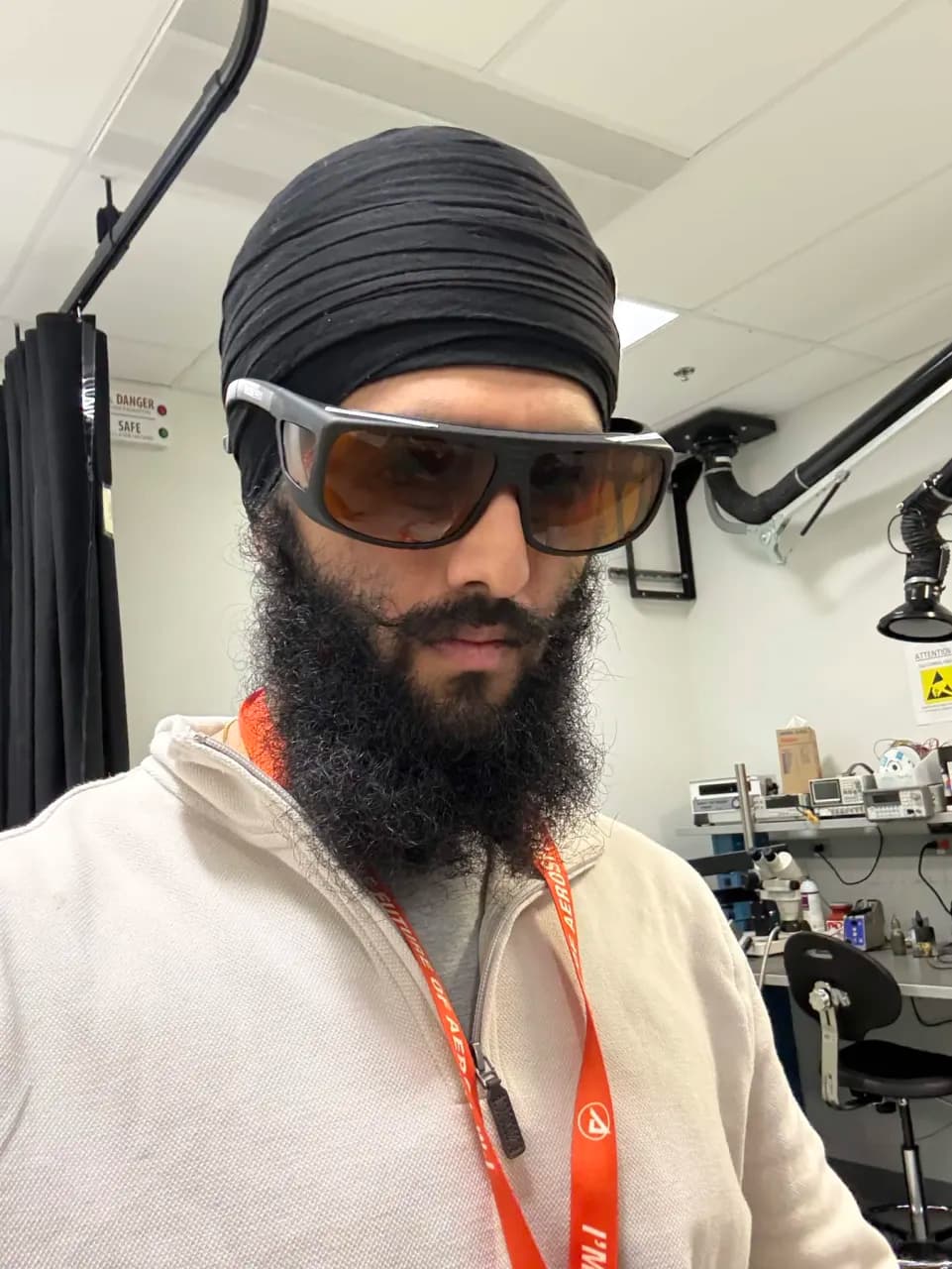 Arjen in the lab wearing protective eyewear.